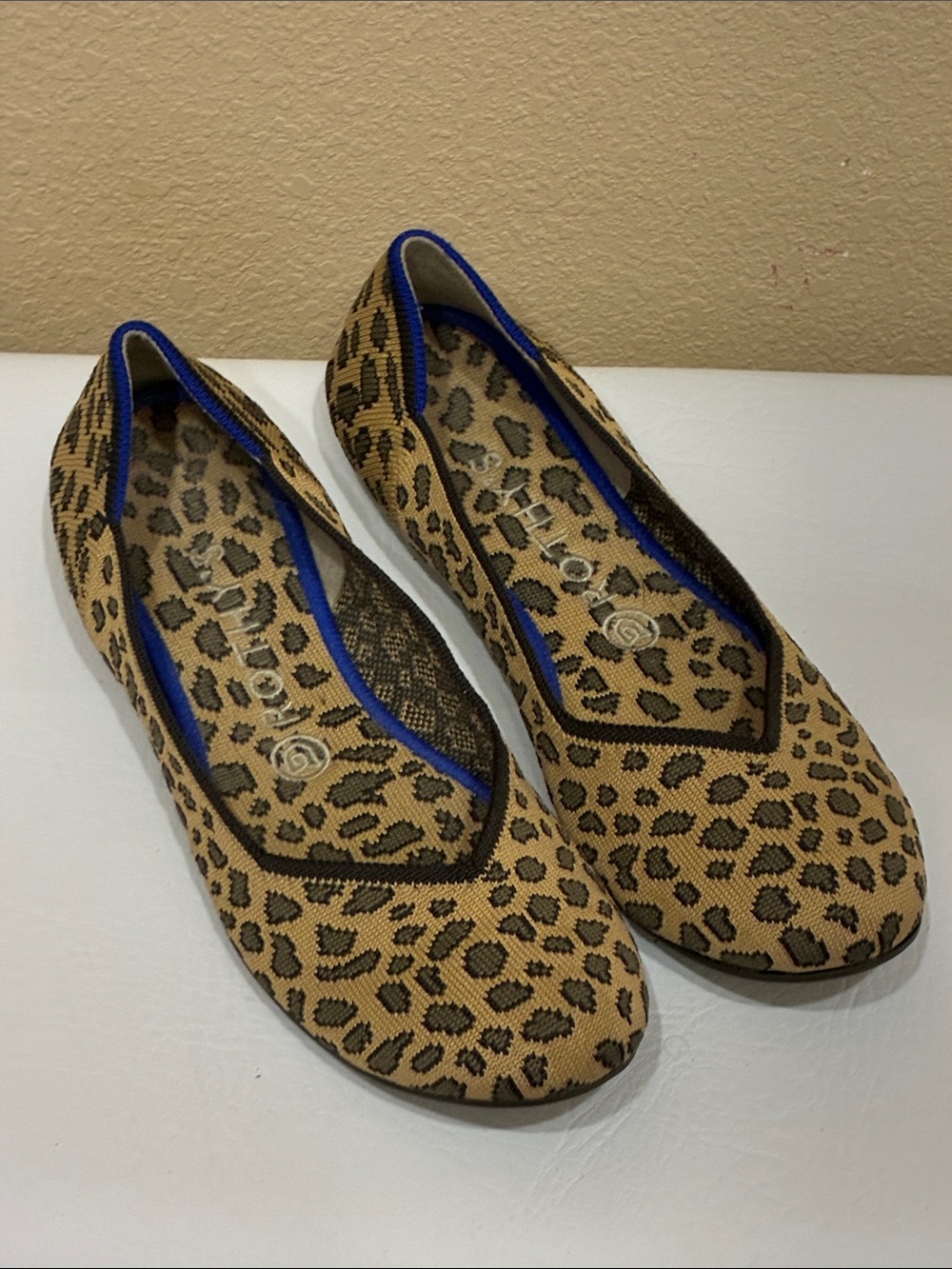 Rothy's Leopard Print Slip-On Flats in Tan, Black & Blue Trim